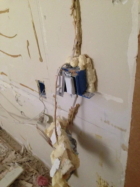 Weird gunk over the electrical outlet. Who knew the hung from the ceiling in residential buildings. And more gunk!