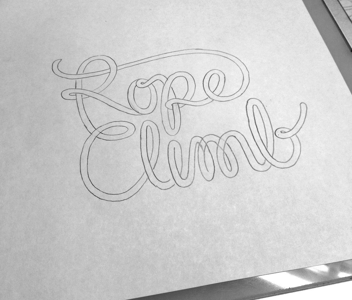 The next step was to refine the sketches. If you look closely, you can see that I increased the space between the two words and cleaned up the curves in the letters. 