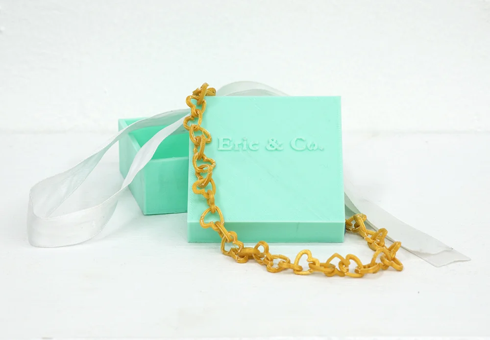 The 3D printed “gold” bracelet is a parody on the commercialization of gestures of romantic affection. Featuring the iconic robin’s egg blue of Tiffany’s Jewelers, this project plays with ideas of how we determine value.