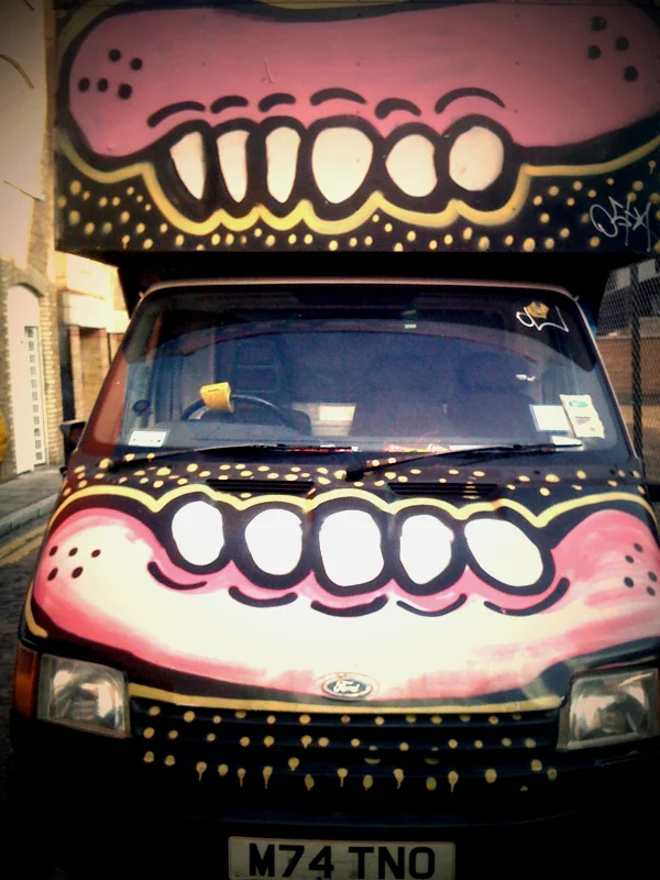 More From Brick Lane, this van is often parked outside my brothers apartment. I think it's a mobile dentist...