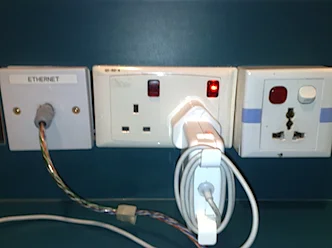 I may have my grievances about Singapore but I can not fault Changi Airport. Heathrow take note this is how you do a laptop station. Ethernet for more secure logins to your email/ftp etc. Enough power outlets that actually work, and what's that on the right yes a universal power socket. You would almost believe that someone thought about this for 5 minutes before building it. Oh and it's free.