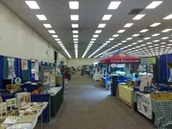 UPDATE: The organiser of the Expo has posted a long response to this post in the comments, and is worth a read. I stand by my comments which were my personal experience of the show and reflect my disappointment. They do not represent the opinion of GreenPrint in general.
The GreenPrint team are at the Earth Works Expo in Denver Colorado, and we are bored silly. I could hardly imagine a worse organised expo I have been to. The horror starts with the building that the whole thing is housed in. The Denver Merchandise Mart is a vast 1960's block with no windows, dreadful grey suspended ceilings and the sort of carpet that if you looked at it long enough would start to cause hallucinations. Its located in the middle of the sort of urban wasteland that America is so well known for. A three lane road on each side separates the building from such exciting retail opportunities as a drive through McDonalds and True Treadmills. Unfortunately for the exhibitors this is the least of the problems, the admission fee for a day at this expo is $19. That combined with the dreadful location has all but insured that no one actually comes. I would be surprised if there have been more than five hundred paying attendees. Most of the people walking around are fellow exhibitors similarly bored desperately looking for something interesting or some sign of hope. We were of course told in advance by the organisers that they were expecting 10,000 people, a number so fanciful that could not be reached without significant chemical stimulation.
I have so far managed not to argue with the people selling electro-smog prevention products that are "proven" to work. Proven to work against what, I would like to ask? I haven't been particularly tempted to join up with the interfaith group against global warming. This despite the use of acoustic guitar and singing in their seminar on belief and climate change. I know I am a cold hearted atheist.
On the plus side the disaster has given us the opportunity to get out of here early and head up through Montana to Yellowstone national park and back to Portland by a slightly longer but far more beautiful route.