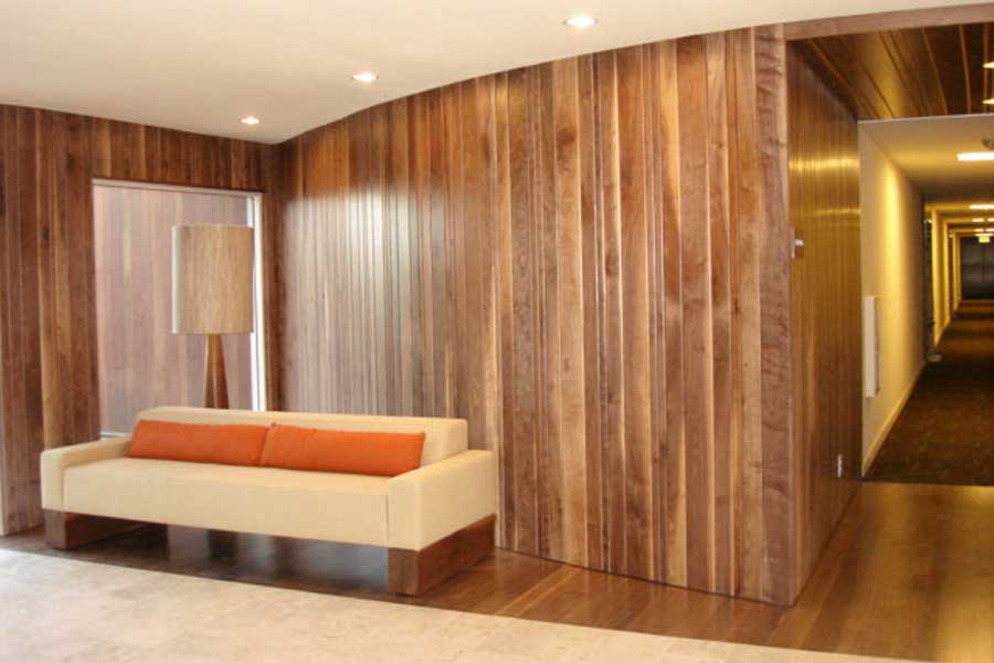 Beam Sofa in Wood Paneled Room