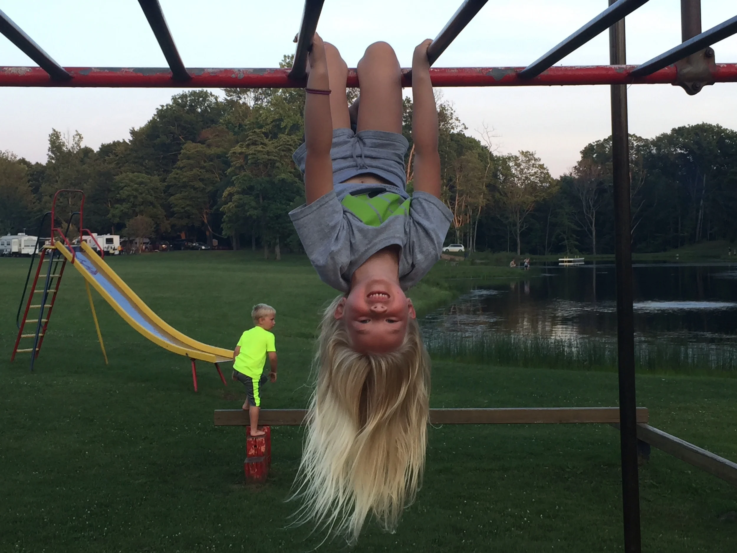 If nothing else, I've managed to teach her how to use monkey bars appropriately.  