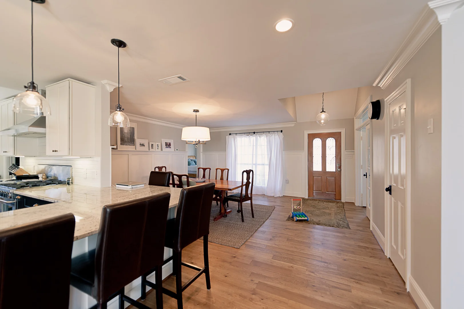 After: You may notice the front door is still the same.&nbsp; We keep talking to our ProBuild rep about that....maybe next month.&nbsp; ​In addition to new walls, moulding, paint and lighting, we knocked out the two, small vertical windows and put i…