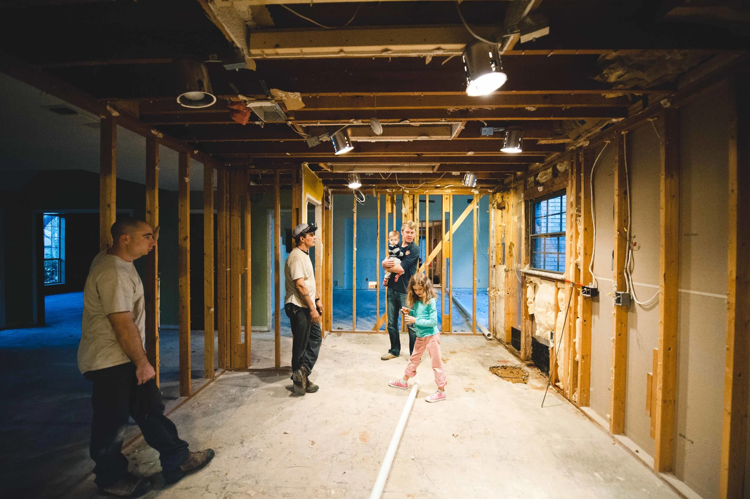 During: One of many evening conferences with the plumbers.​