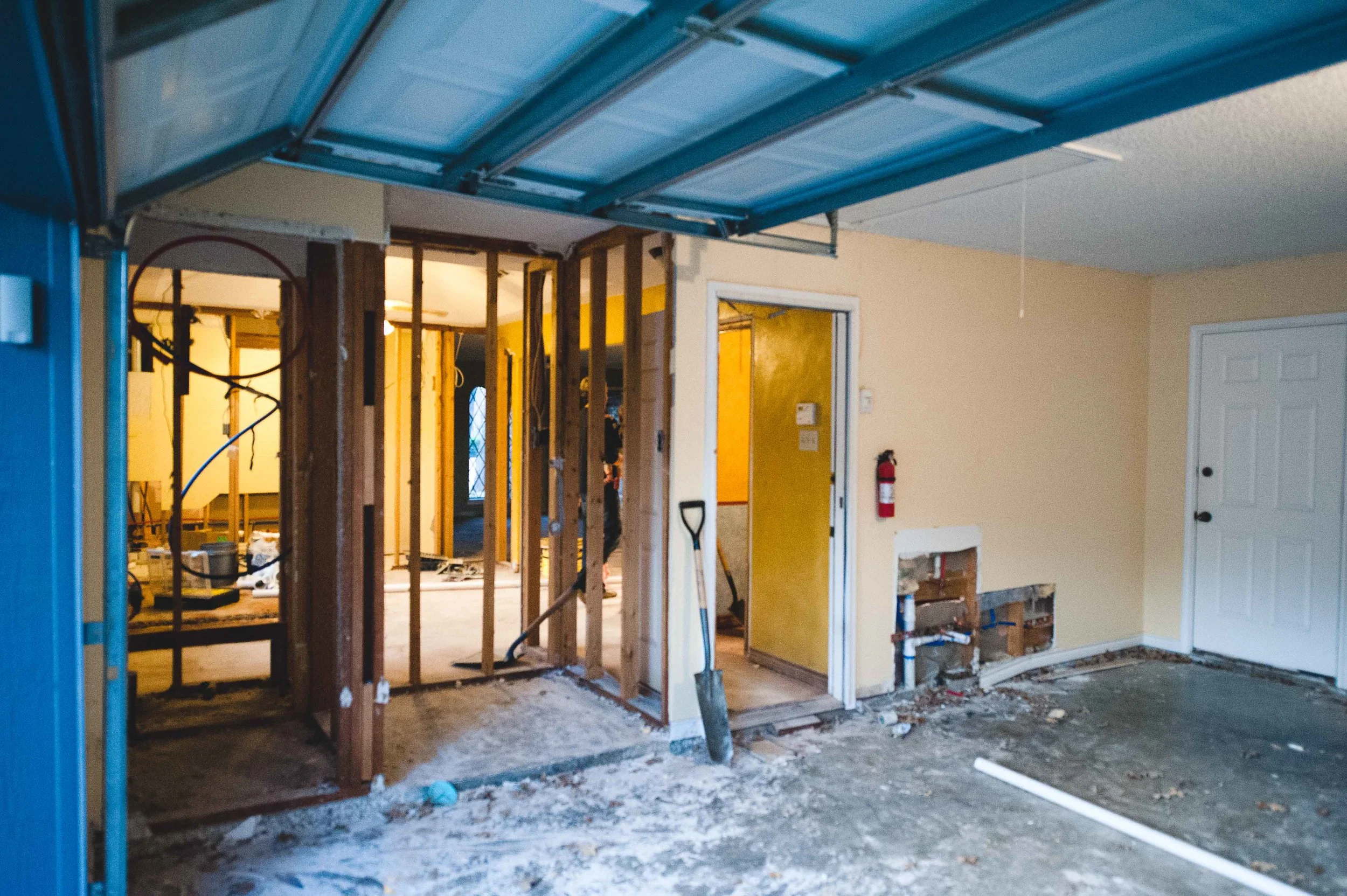 During: The water heaters were replaced with tankless units and moved elsewhere, allowing us to covert their closet, and a niche in the garage that was previously used for trash containers, into indoor square footage.&nbsp; Half went to the new pant…