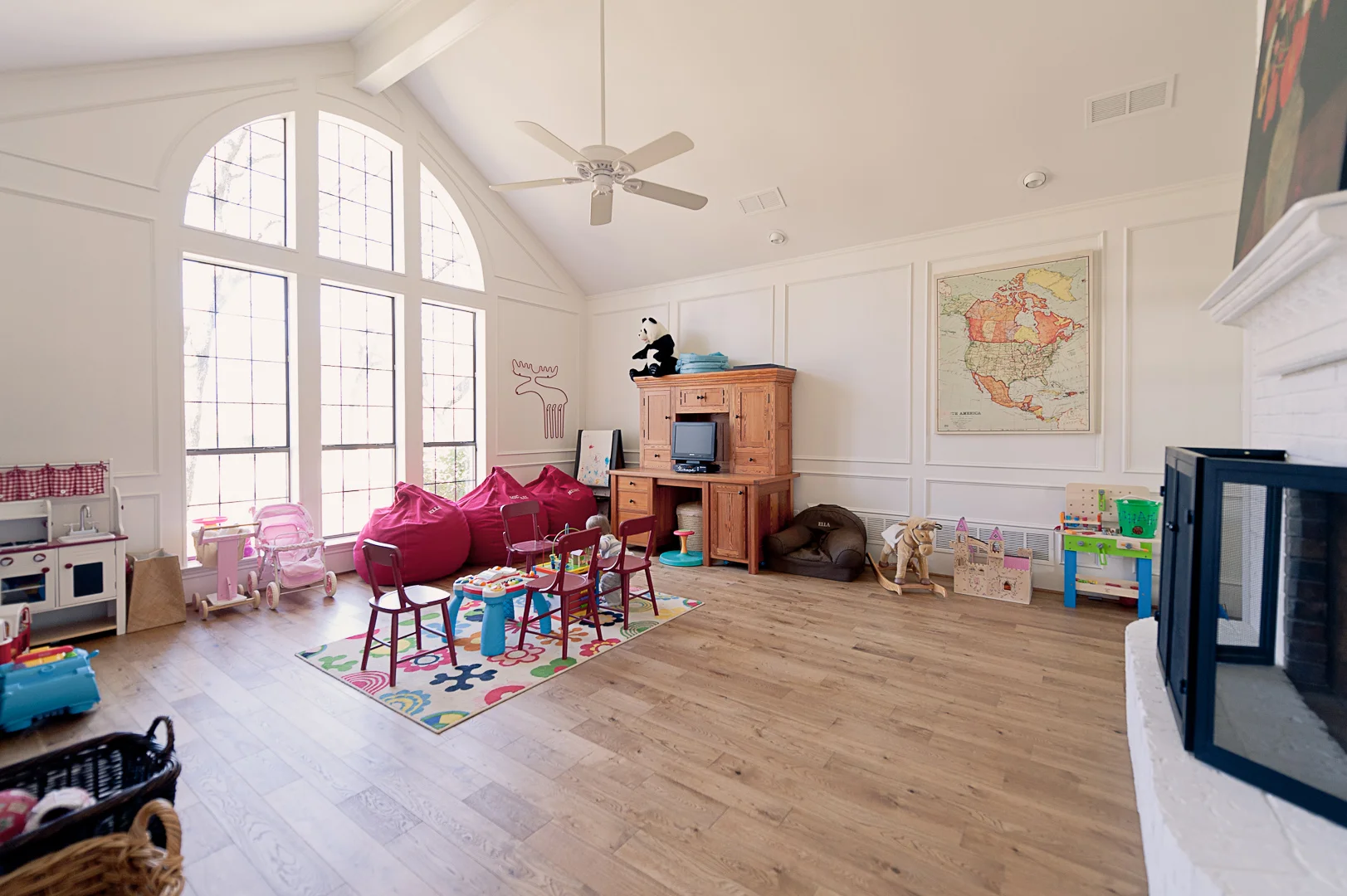 After: Our lament about this room is that it has the home's only fireplace. One day, I see it being used as a media room or family space that more than just the kids will enjoy. Of course, if Matt has his way, it'll be reborn as a killer office when the kids are a bit older.