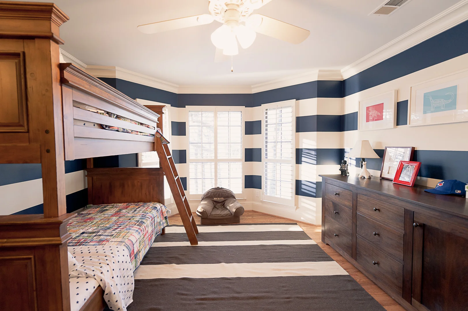 After: I couldn't go for solid navy walls per Michael's request, but I think he likes the compromise of the stripes.&nbsp; ​