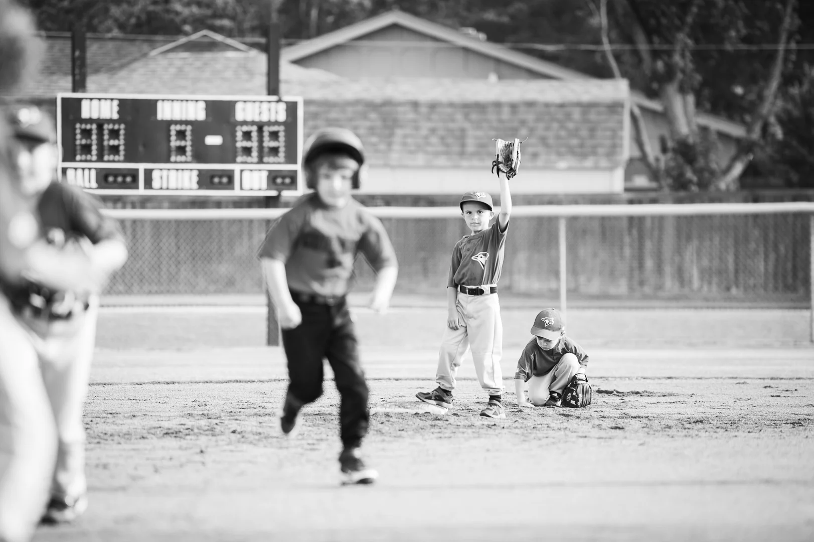 Coach says he's got the best arm on the team and tons of potential. If only he'd quit playing in the dirt when major plays are happening. (It's good to have goals, I say.)