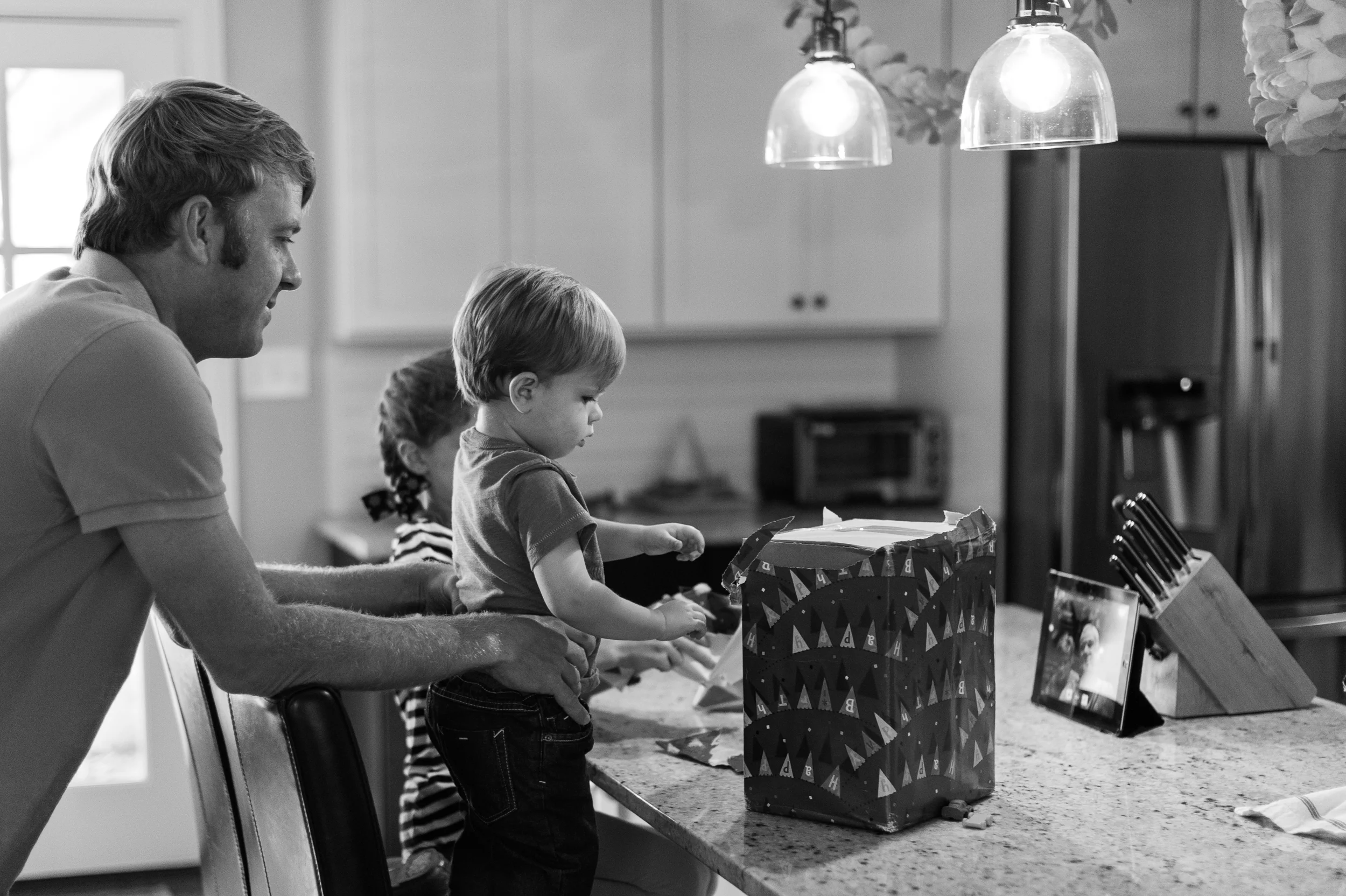 The morning started out with a Face Time session with Poppa and Gigi. Henry's biggest problem was fending off his big siblings so he could have some time to play with his new toys.