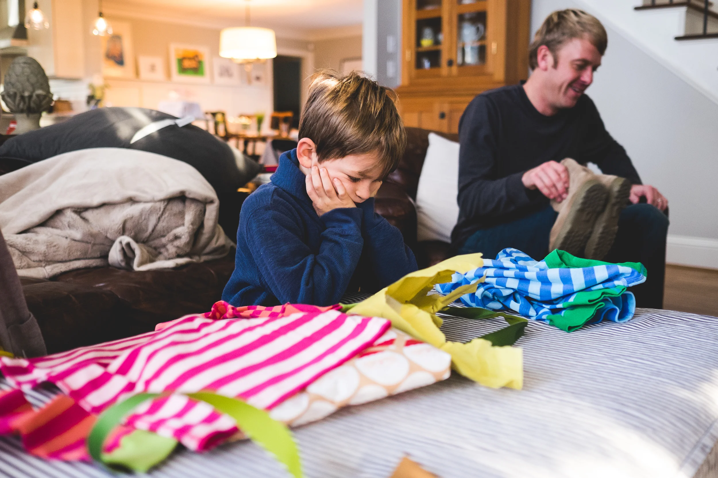 What it looks like when a six-year old opens a present with pure excitement only to discover...it's jammies. (It ended well. They are his favorite jammies now.)