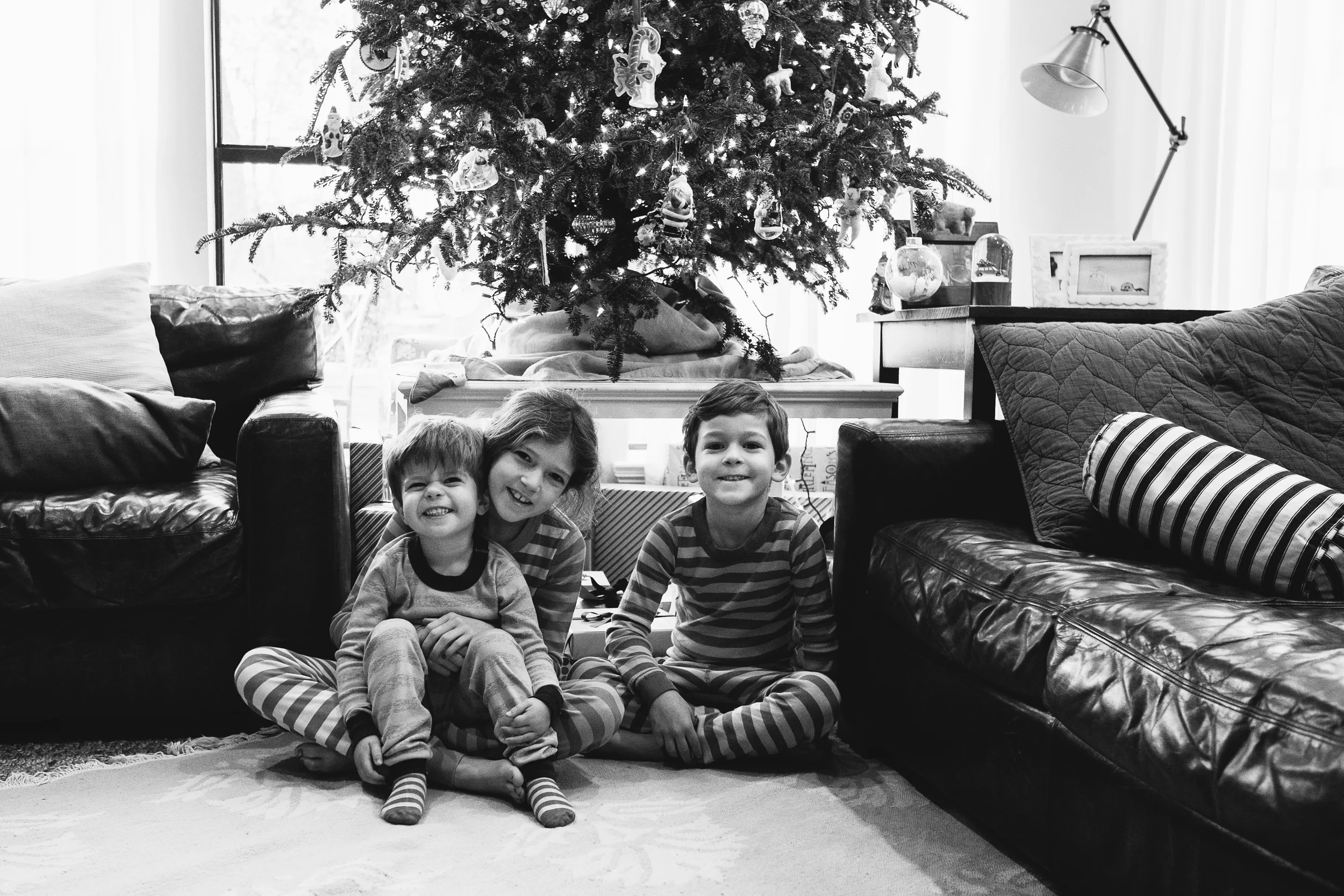 How to get your kids to pose for just one quick photo together on Christmas morning? Threaten not to let them open any gifts until the next day. Yes, I went there.