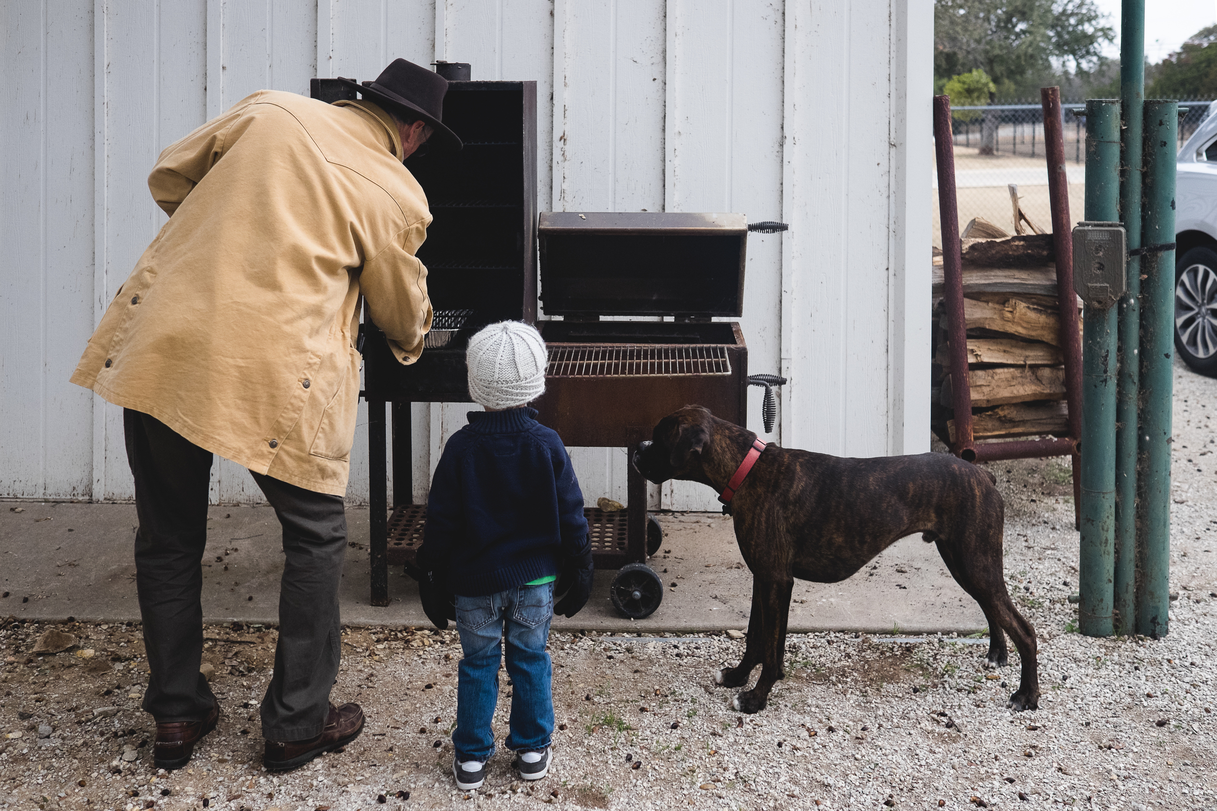 Time to get the ribs smokin'. Brisket was anxious to learn as well.