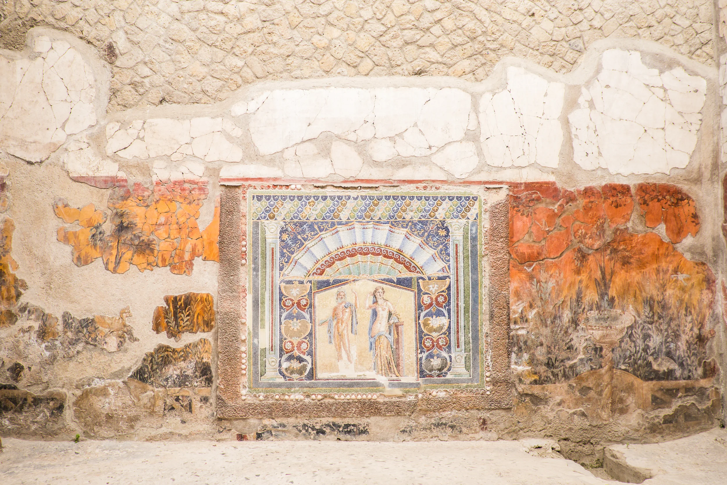 Two thousand years ago, these buildings, homes and courtyards were decorated with plaster, bright frescos and intricate mosaics. 