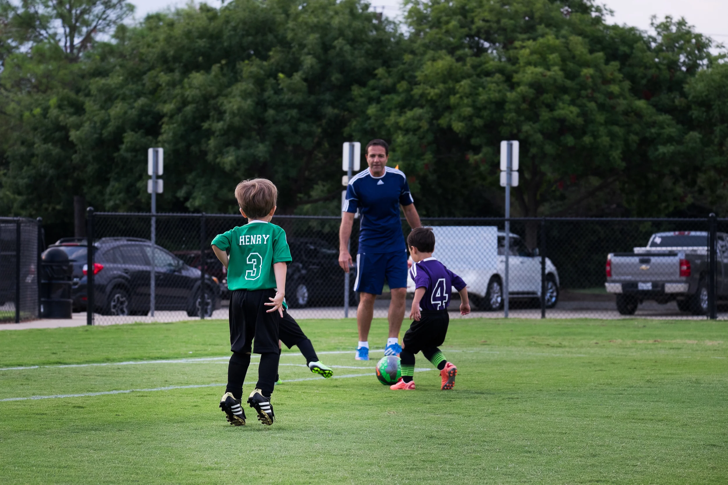 Henry prefers jumping and pointing to actually running at and kicking the ball. It's a process...