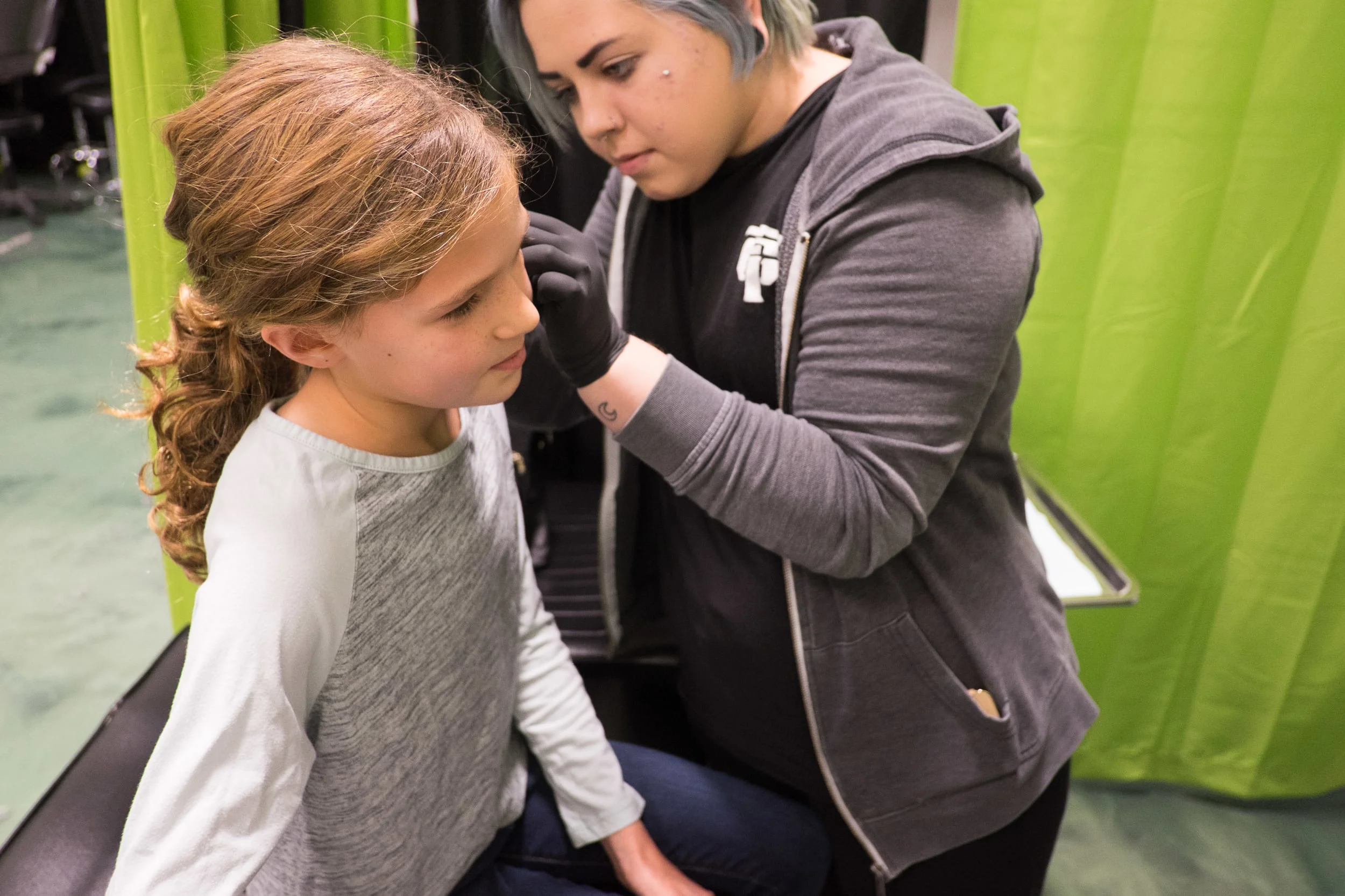 ...still During. And if I had an After shot that was in focus, I'd share. Oh, well. She was clearly the bravest, coolest kid in the tattoo parlor that day.