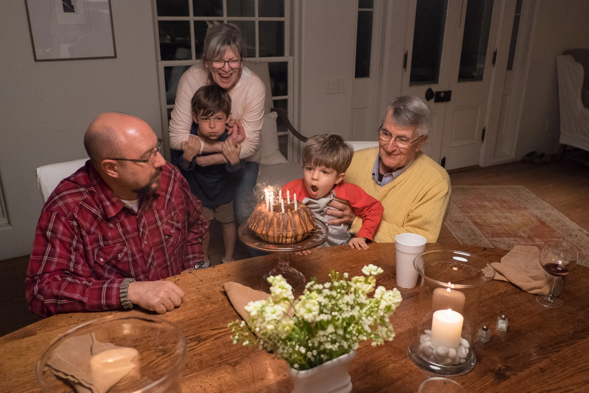 Happy birthday to Uncle Mel and Uncle Clif! Thankfully they don't mind a little help with blowing out their candles.