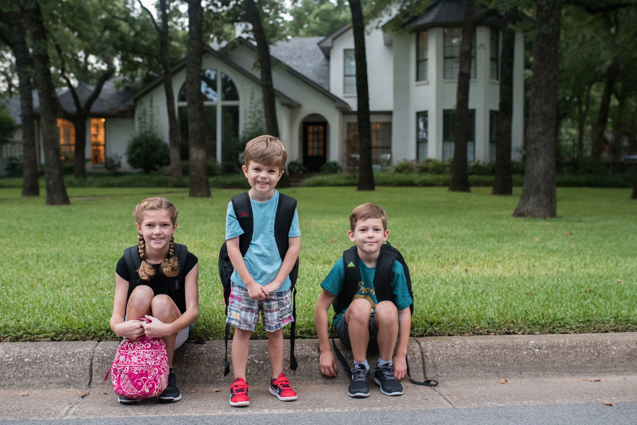 If Henry sat down with his backpack, he'd never have been able to get back up. Smart kid. 