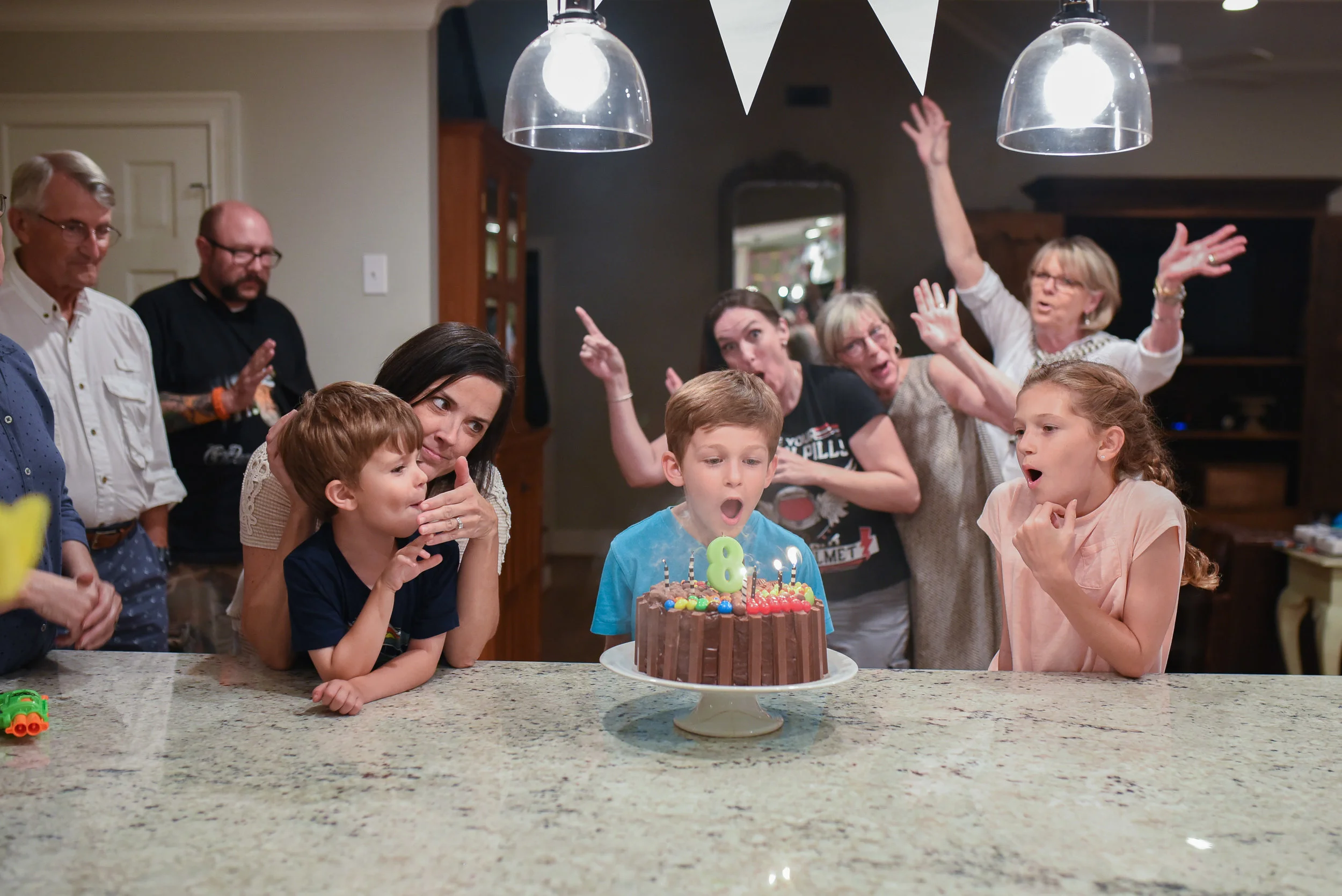 I love this photo. Thank you to our crazy family who happily jumped in the frame when I asked for more people to stand behind Michael as he blew out his candles. 