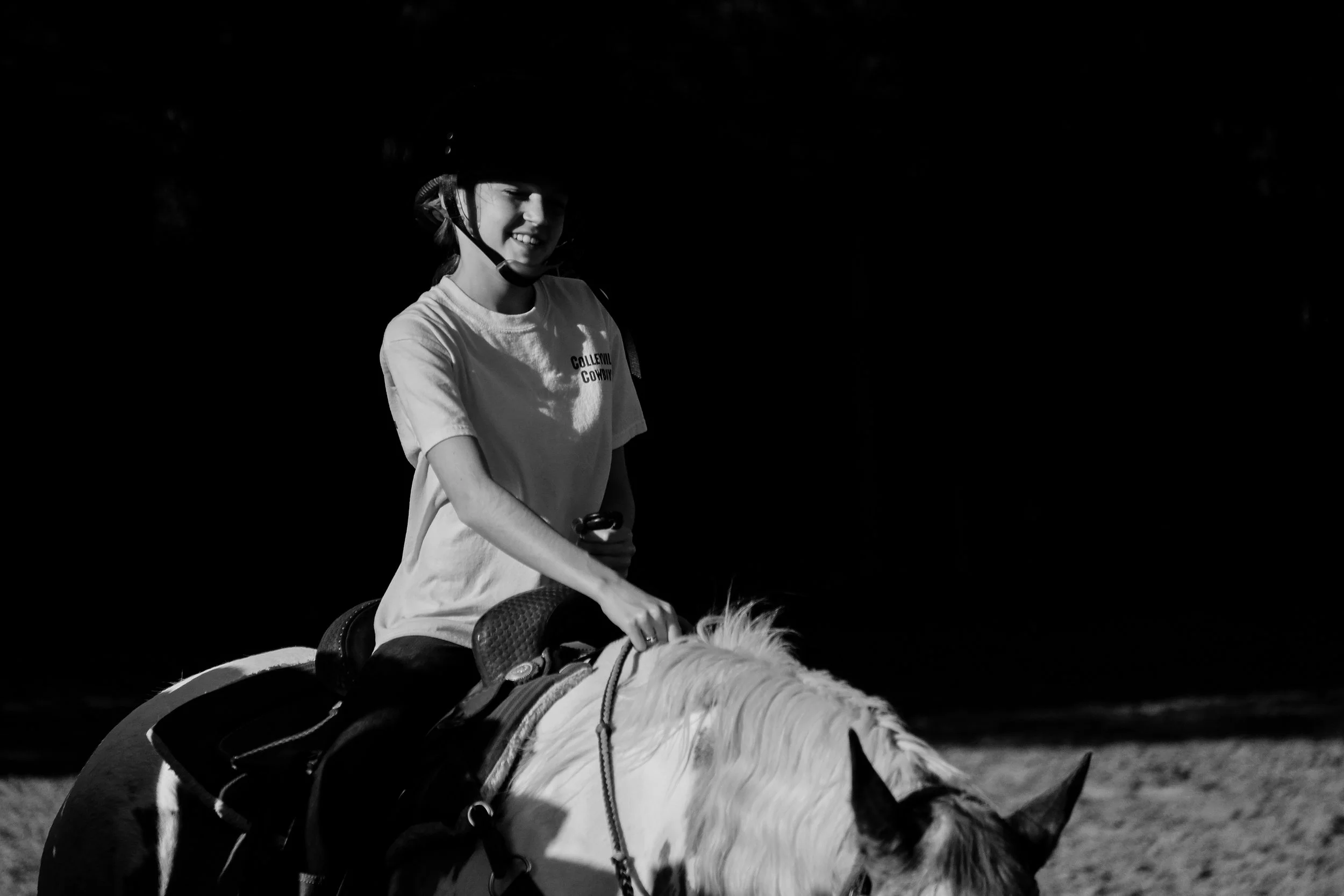 Despite our best efforts to ward it off, the horse lovebug has bitten Ella. Hard. 