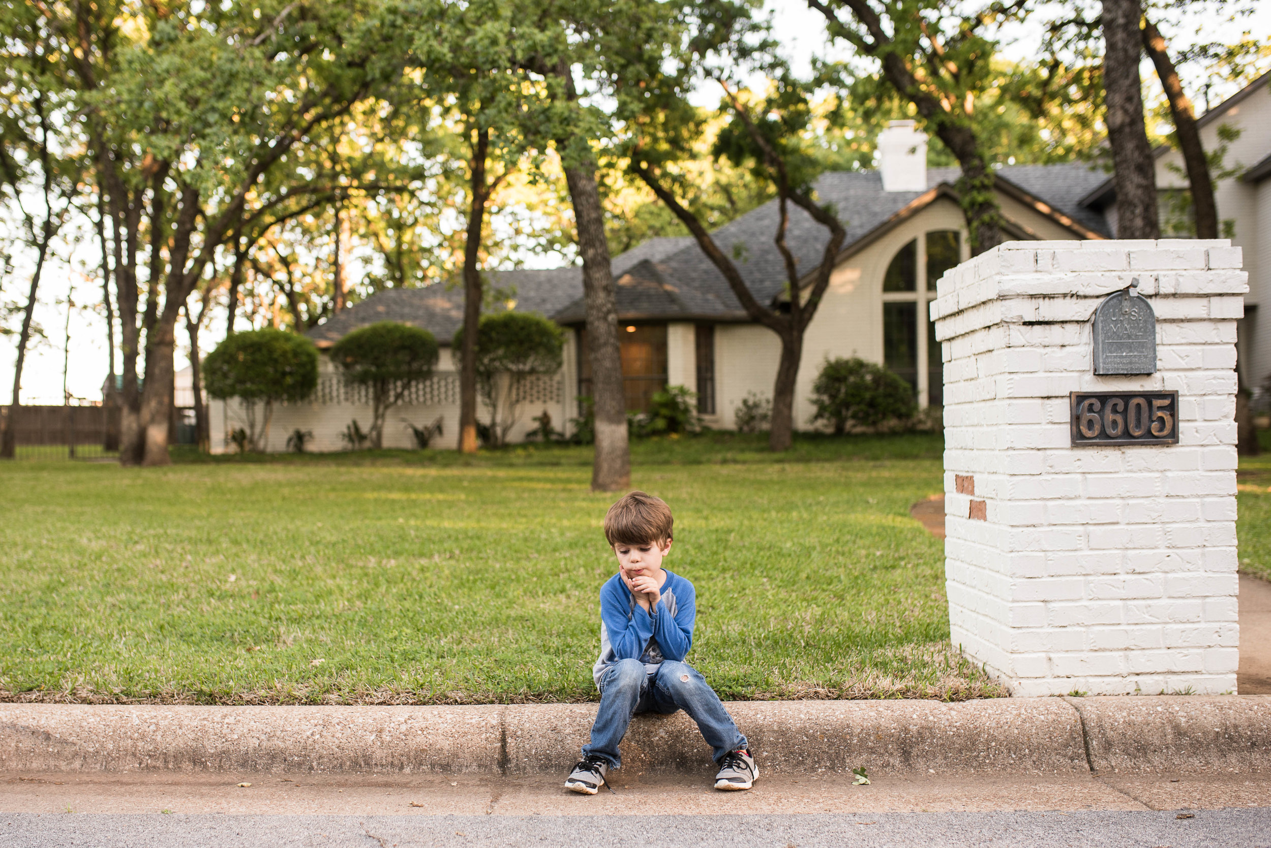 After a tumble on his tricycle, Henry needed a little time to ponder what went wrong.