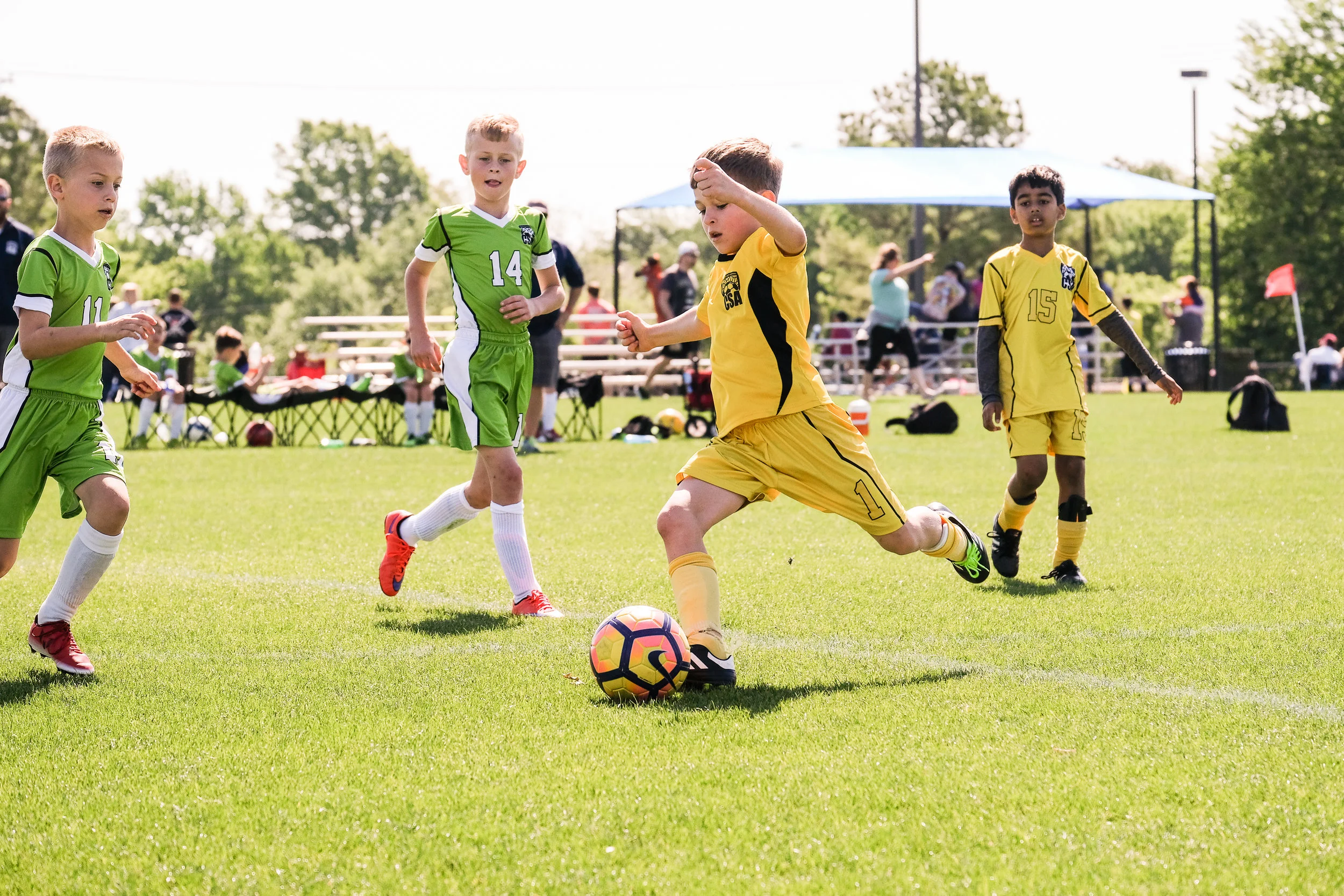 The Minions finished up another great season! At this age, there are no trophies for teams that don't finish 1st or 2nd, but thankfully, Michael hasn't noticed yet. Please enjoy his retro jersey (it was clean!) and inside-out socks (no annoying seams rubbing in his shoes!)
