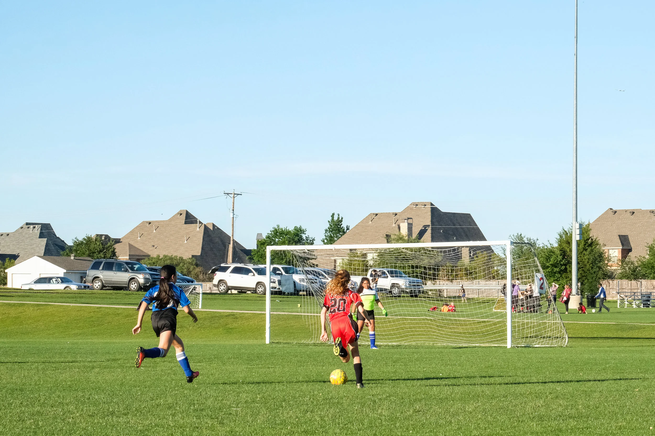 Here she is, advancing one (of three!) goals up the field.
