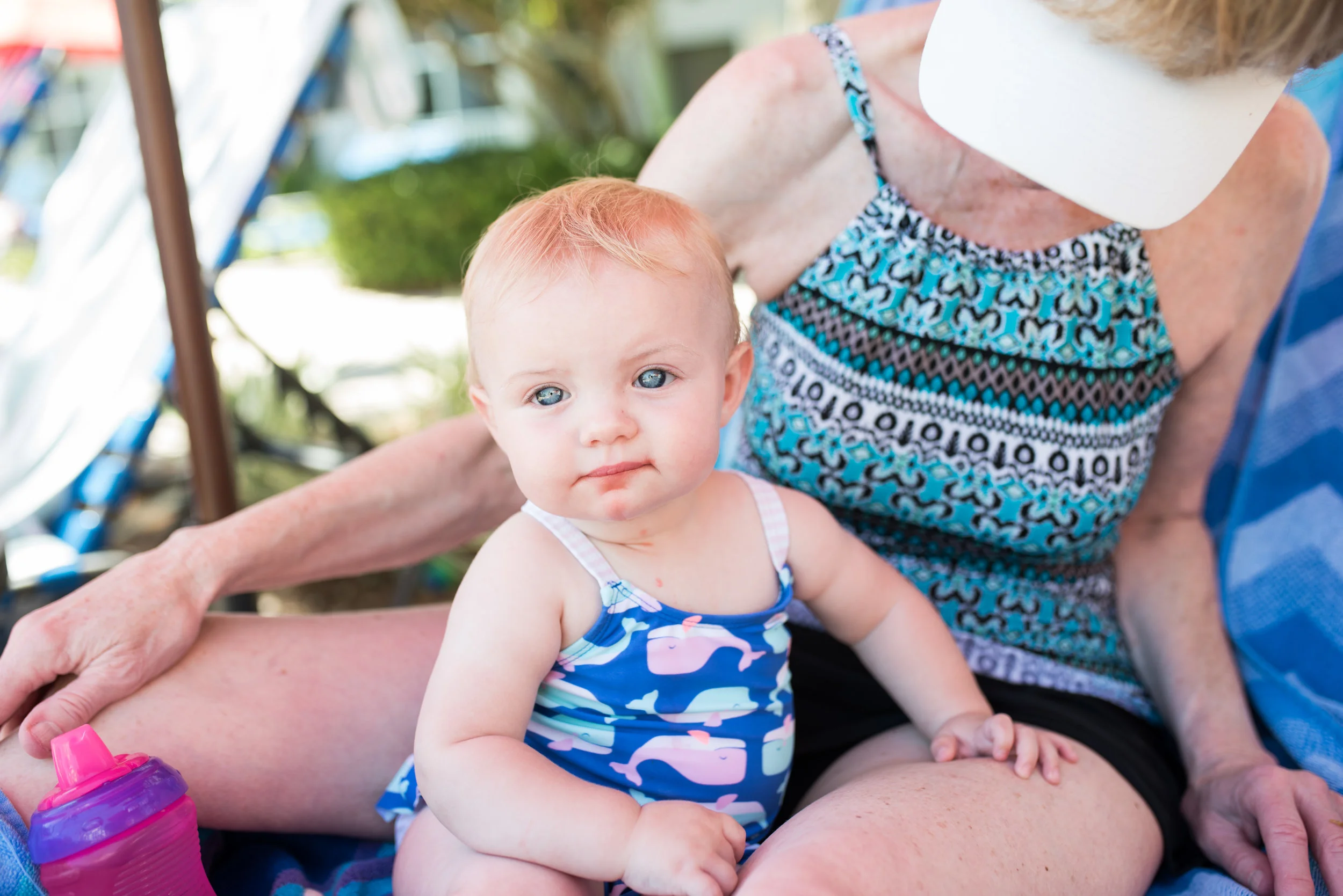 While the Florida weather didn't want to cooperate for our whole trip, we were lucky to have a great hotel pool complex with lots of activities for the kids to enjoy, rain or shine. In this photo, baby Jen had just enjoyed a (watermelon?) treat! And because I know some of you are probably thinking it, I didn't use "Iris Enhance" even a smidge on this little beauty. Her eyes, not unlike her mama's and her brother's, are just crystal clear and gorgeous. 