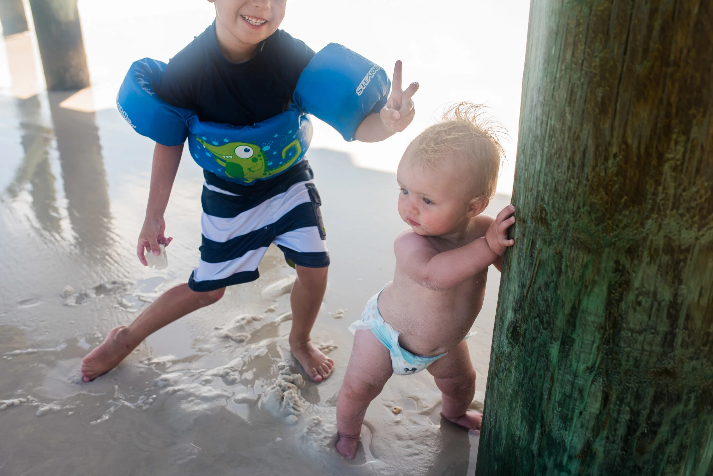 While technically a terrible photo, this one really cracks me up. Jen looks like she's posing for a magazine shot and Henry is so dang tickled with himself. 
