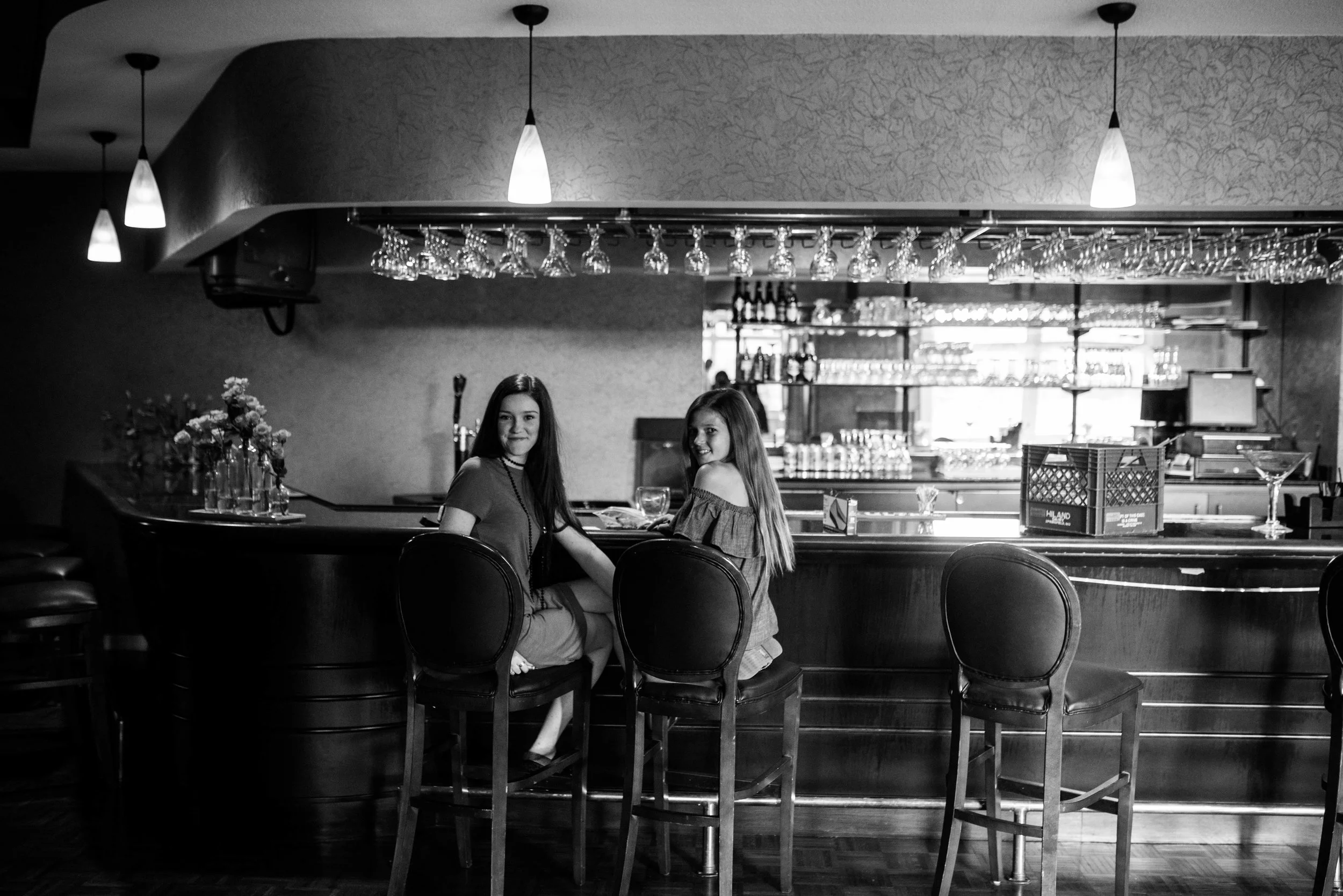 These girls looked a little too grown up sitting at the bar, working on cards for the party. 