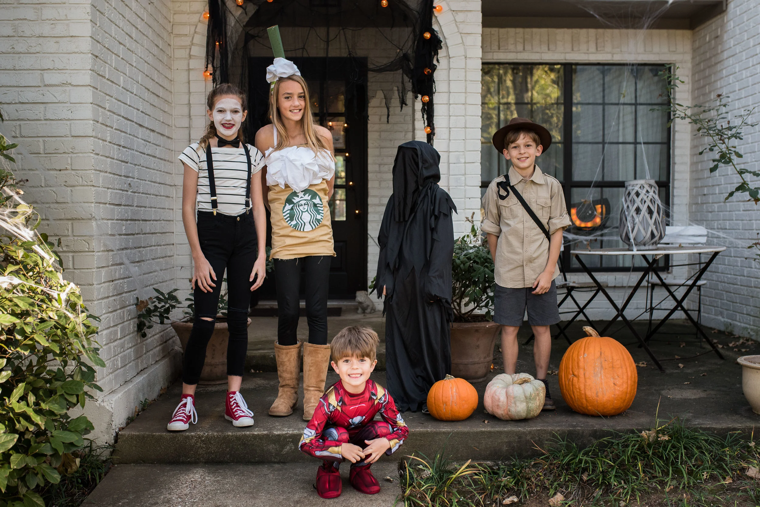 Happy Halloween! From our mime, her friend the Frappucino, Indiana Jones and his friend the Grim Reaper, and of course, Iron Man (who decided he didn't like the light-up mask and gloves he HAD to have.)