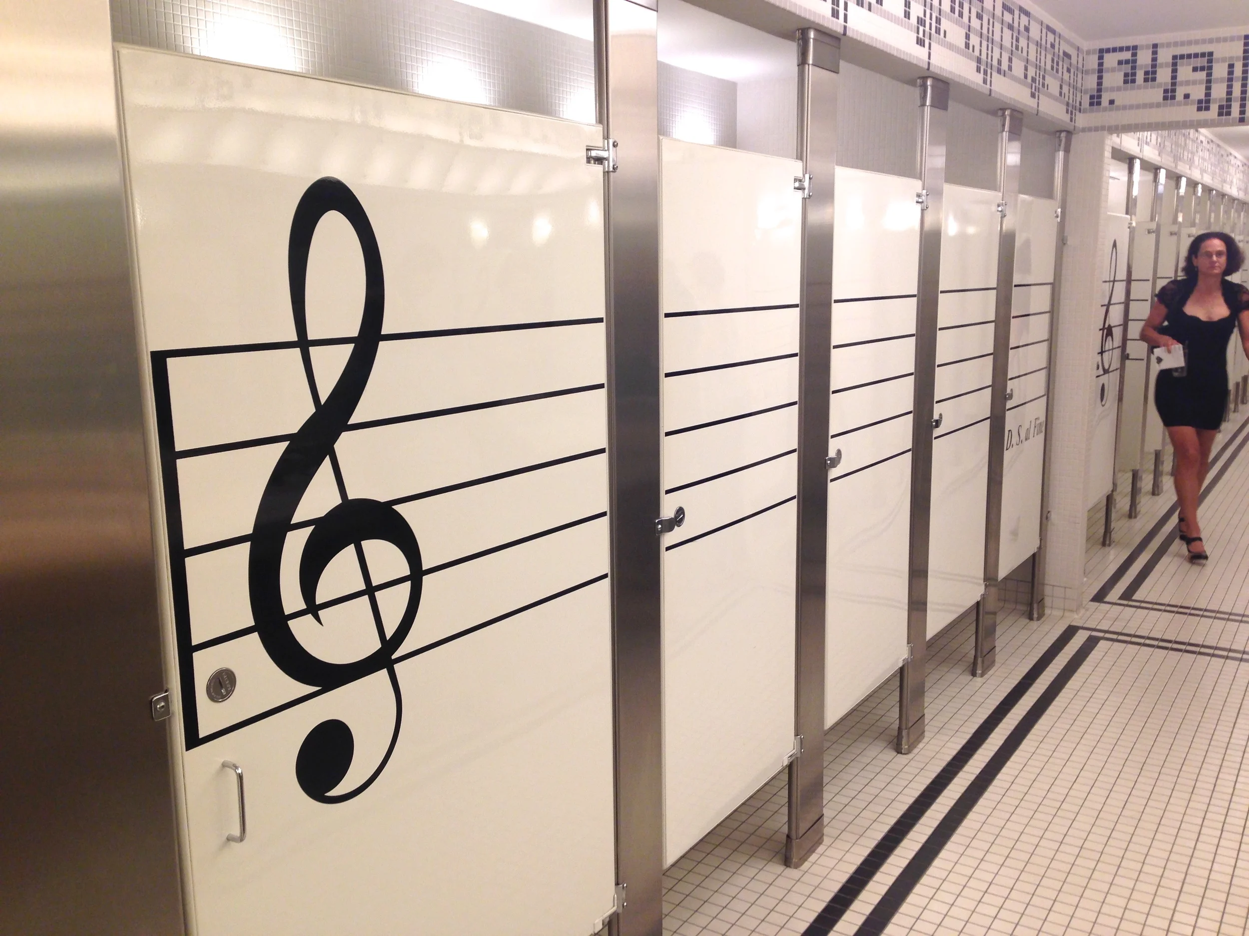 The women's bathroom stalls at Bass Hall in Fort Worth are surprisingly free from musical graffiti.