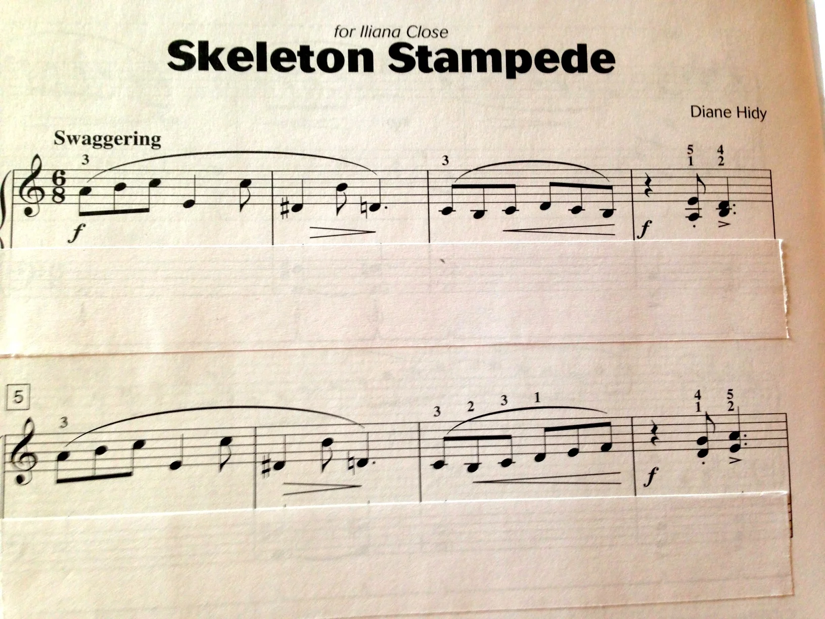 Wouldn't this make it easier for your student? The piece is from Attention Grabbers Book Two . 