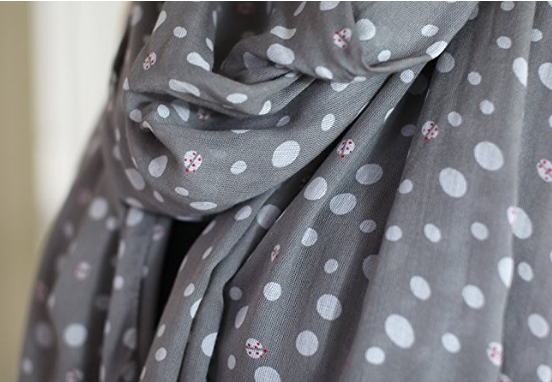 I love wearing scarves, and this Ladybug Scarf is just subtle enough that it would make a statement and not be over-the-top. I'd love this.