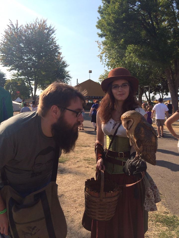 Pictured: me looking at an owl, a lady and an owl.