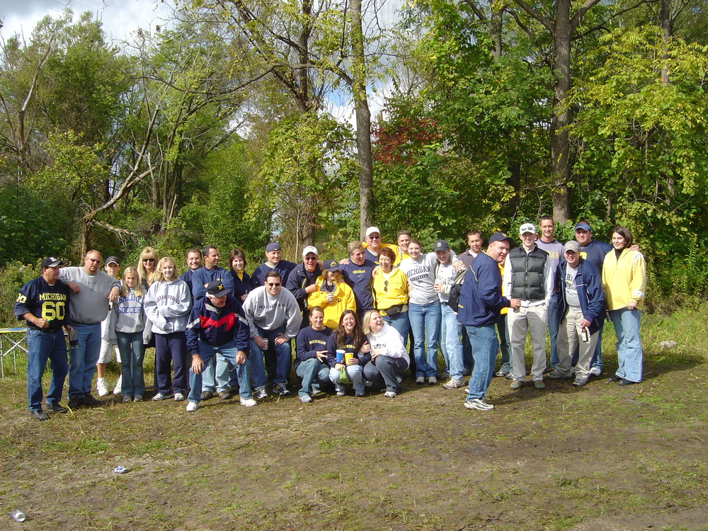 September 23, 2003: The crew poses with the wooded backdrop of the tennis court lot before Michigan's 31-17 victory over the Indiana Hoosiers.
