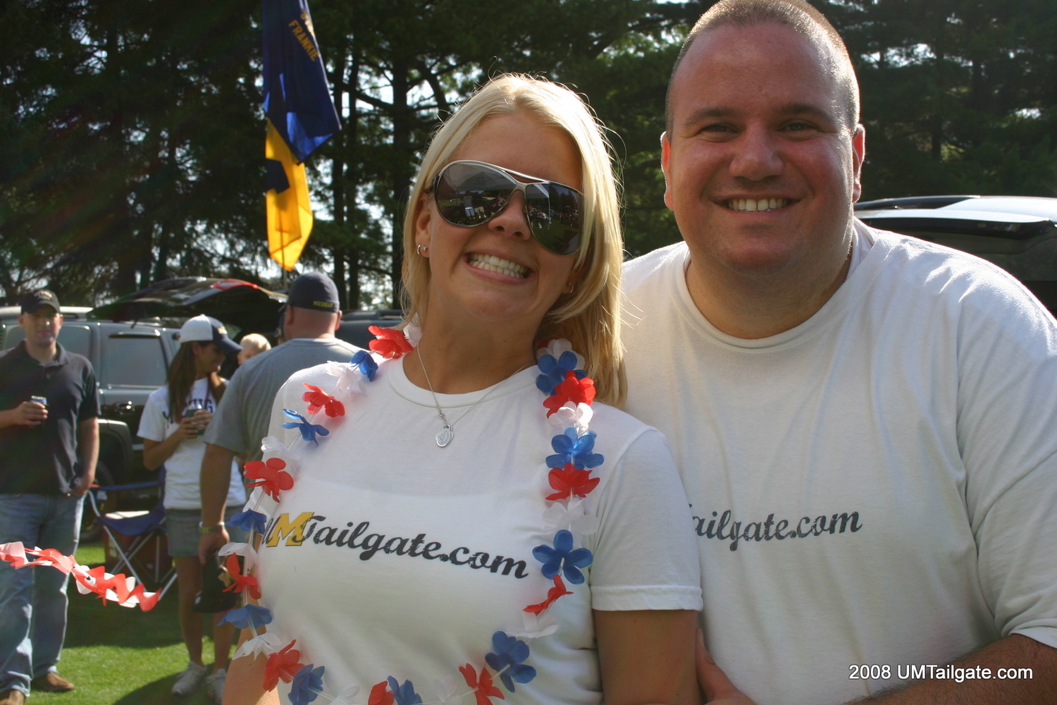 August 30, 2008: The Princess and The Webmaster pose in their UMTailgate.com t-shirts (later the University declared them illegal) before Rich Rod's opener and a loss to the Utes 27-25 . Also, today is her birthday, so happy birthday!