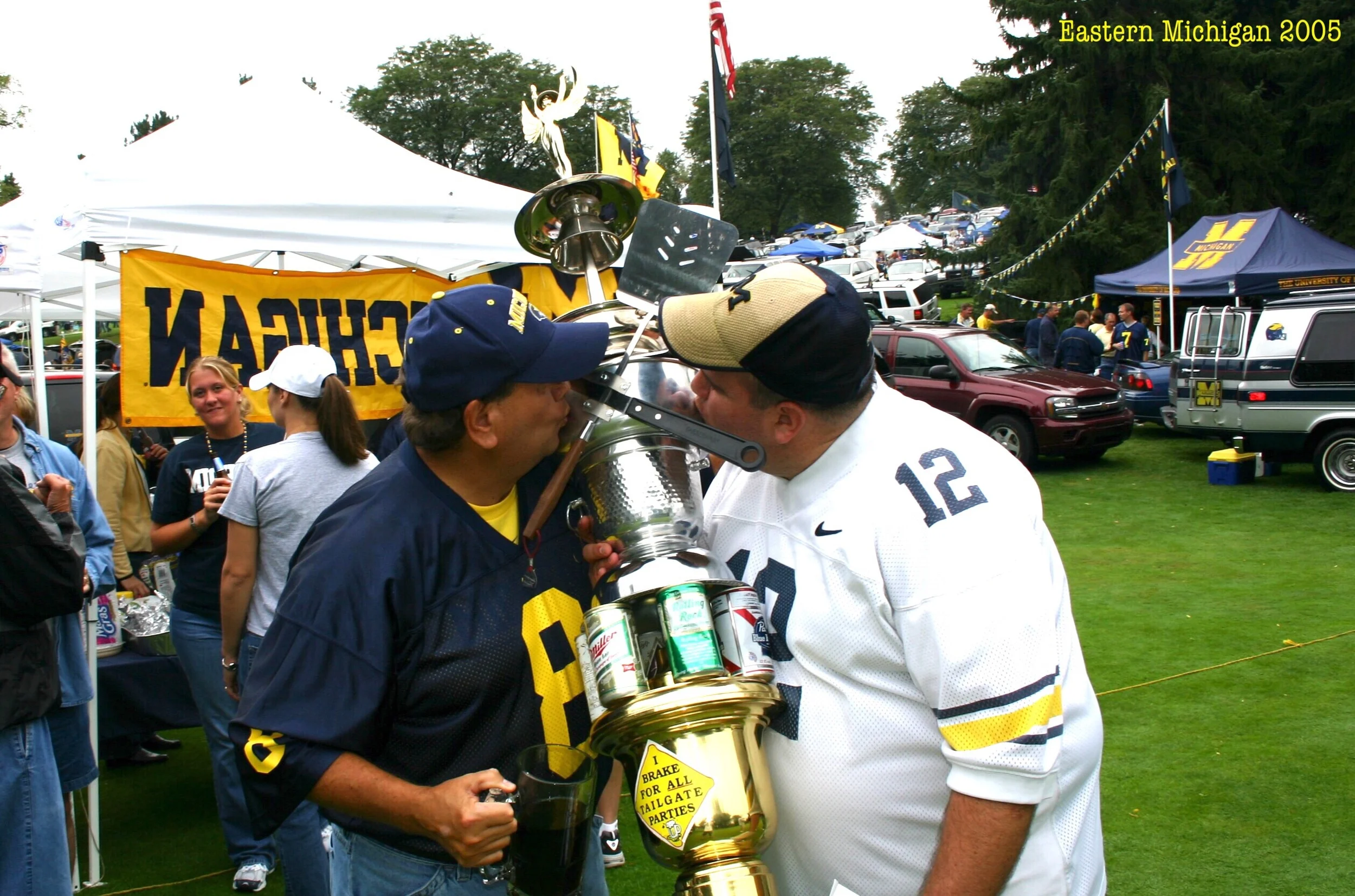 Godfather and Frankie kiss the Tailgate of the Week trophy before Michigan's 55-0 pasting of Eastern Michigan - September 17, 2005