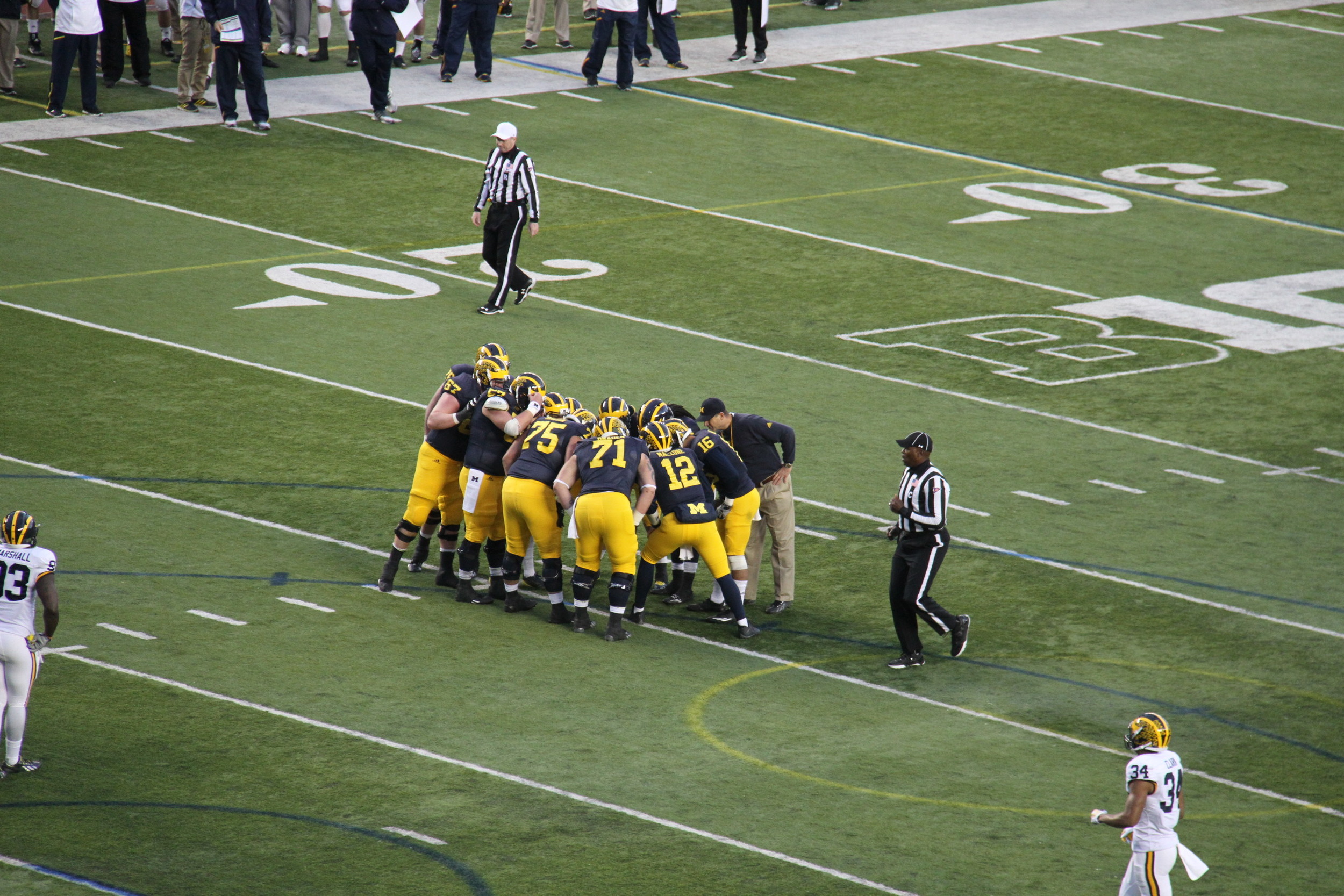 Harbaugh in the Huddle