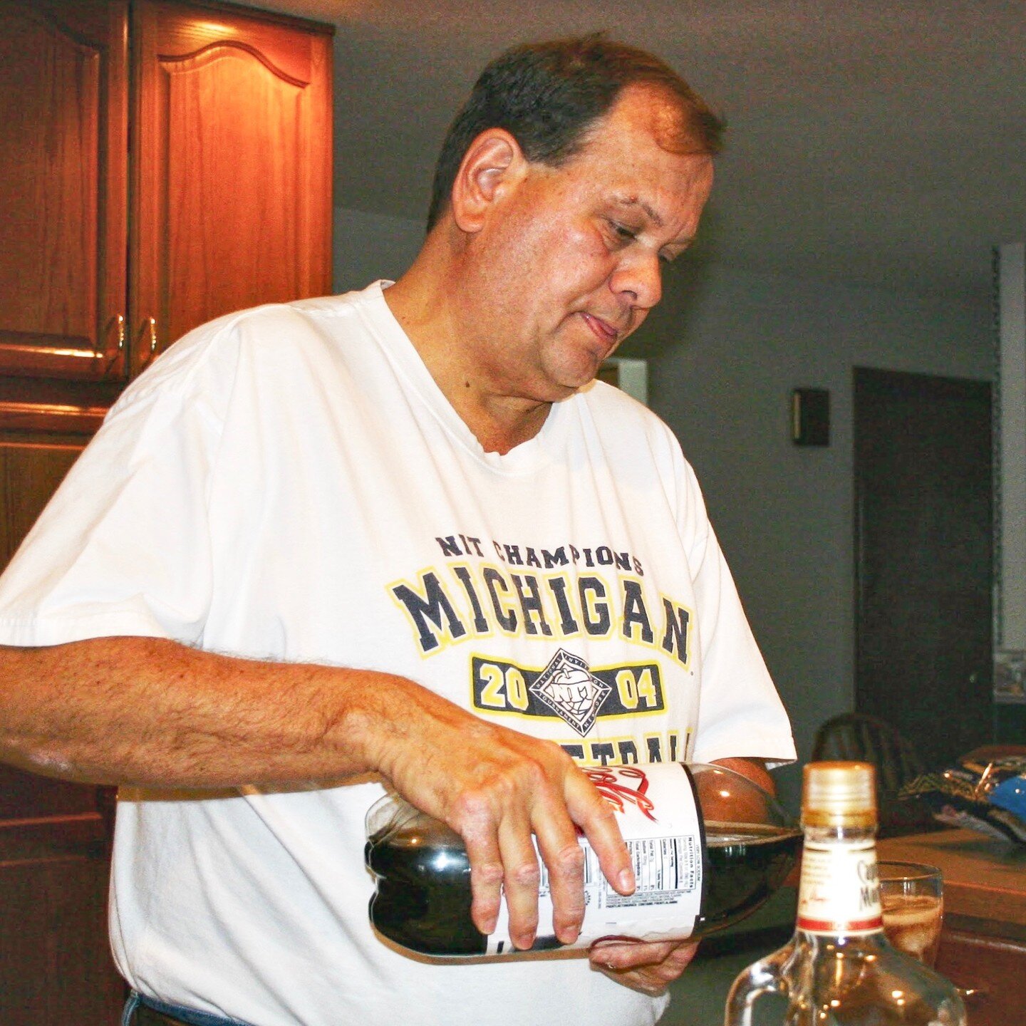 December 3, 2005: The Godfather rocks an NIT Champions T-shirt and makes a drink before the group heads to a hoops game in South Bend where the Wolverines defeated the Fighting Irish 71-67. #goblue