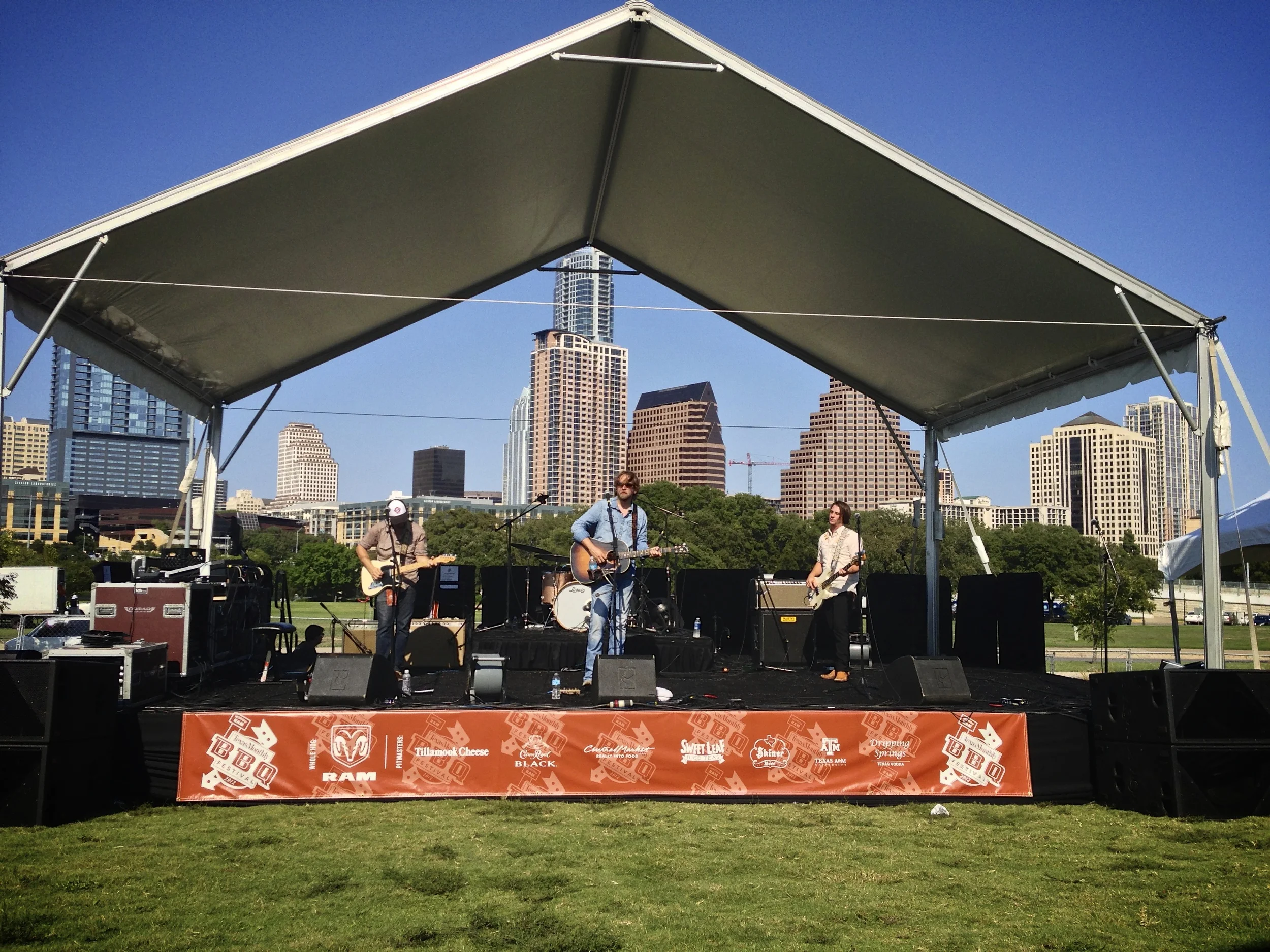 Hayes Carl rocks away the afternoon in downtown Austin, TX.