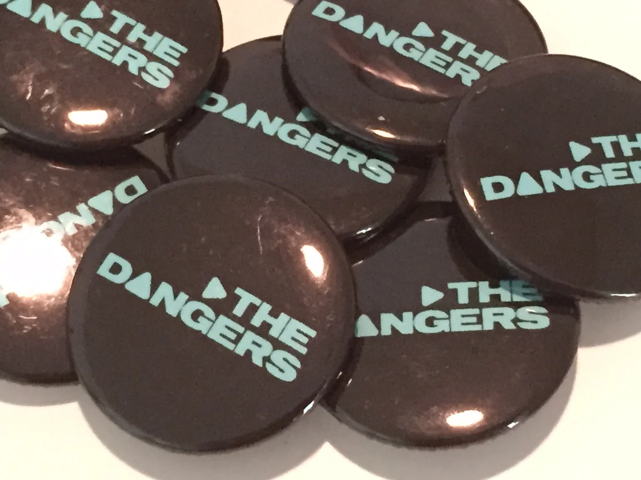 Dangers Button 1.JPG