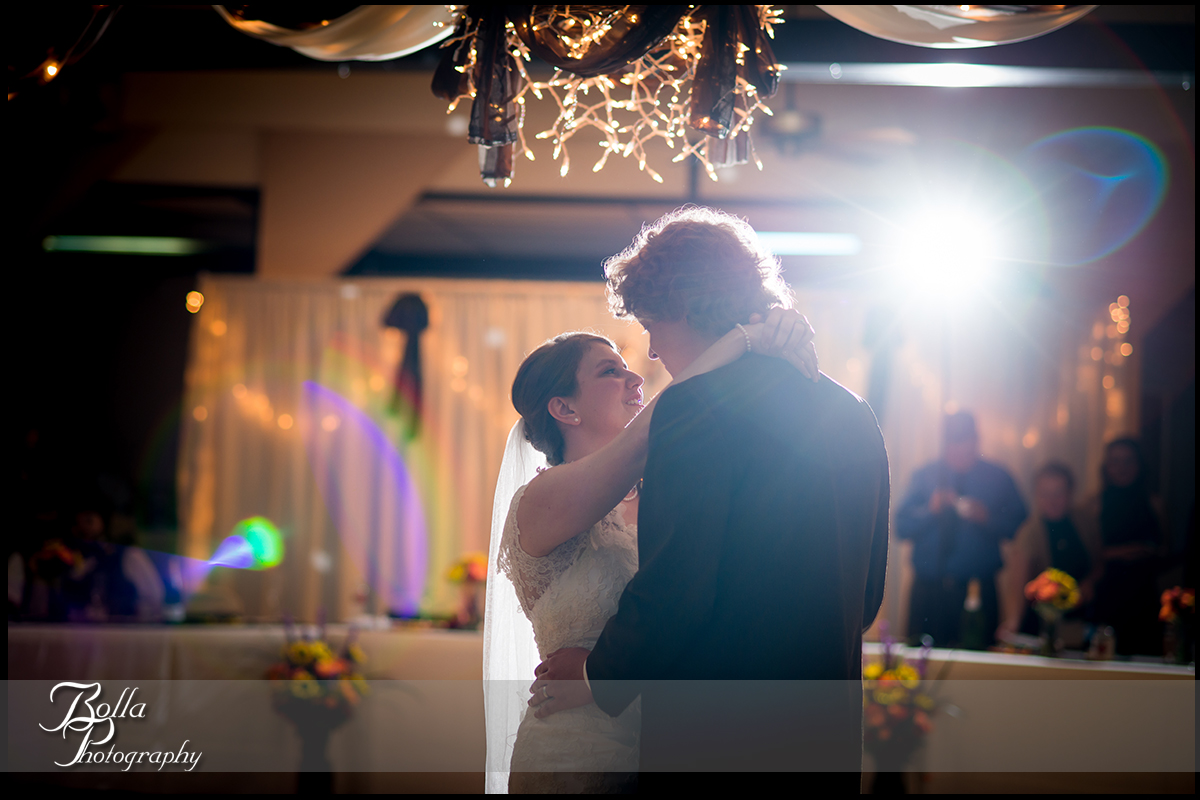 013_Bolla_Photography-fall-wedding-reception-first_dance-backlit-chandelier-flare-Highland-Kuhl.jpg