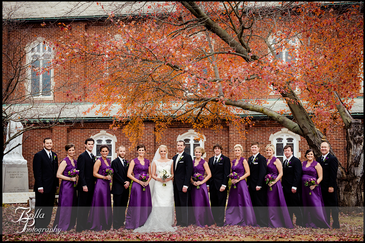 013-Bolla-Photography-wedding-Belleville-IL-bride-groom-portraits-church-wedding-party-bridesmaids-groomsmen-leaves-tree-fall-autumn-purple-Wilson.jpg