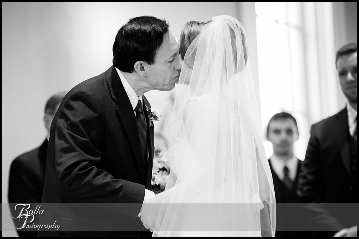 008-Bolla-Photography-Saint-Louis-wedding-photographer-McKendree-Bothwell-Chapel-Lebanon-IL-ceremony-Regency-OFallon-IL-reception-father-bride-kiss-groom-McClain.jpg