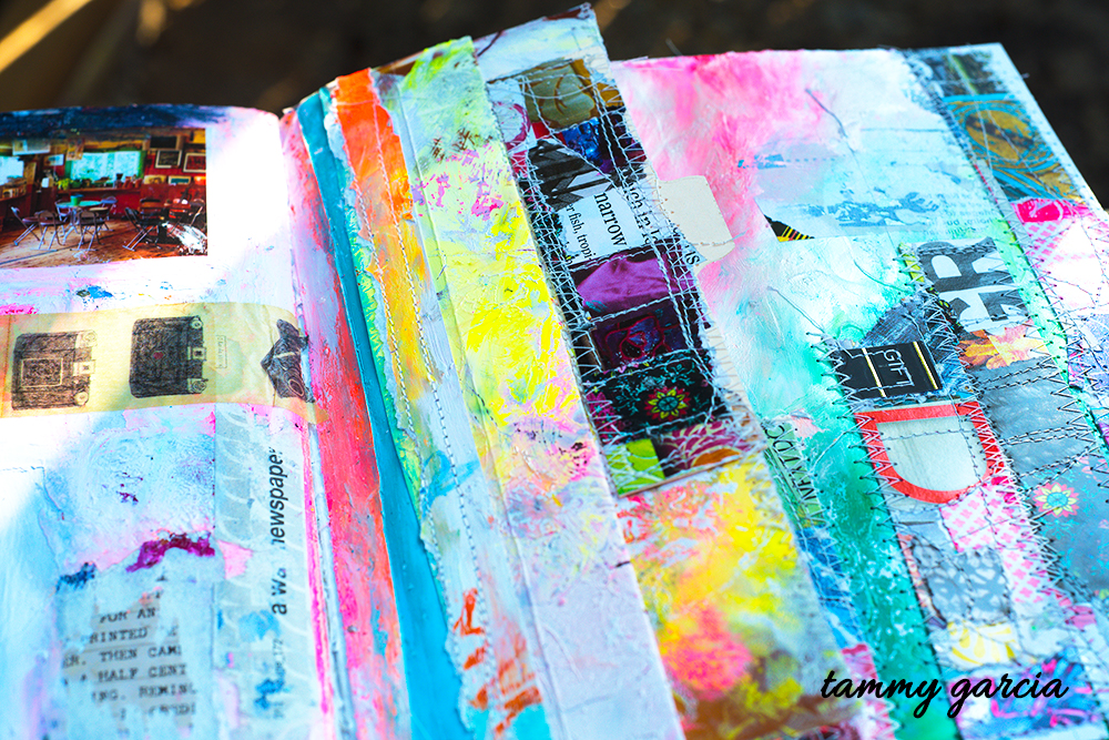 Mixed media art journal page with little stitched flaps by Tammy Garcia