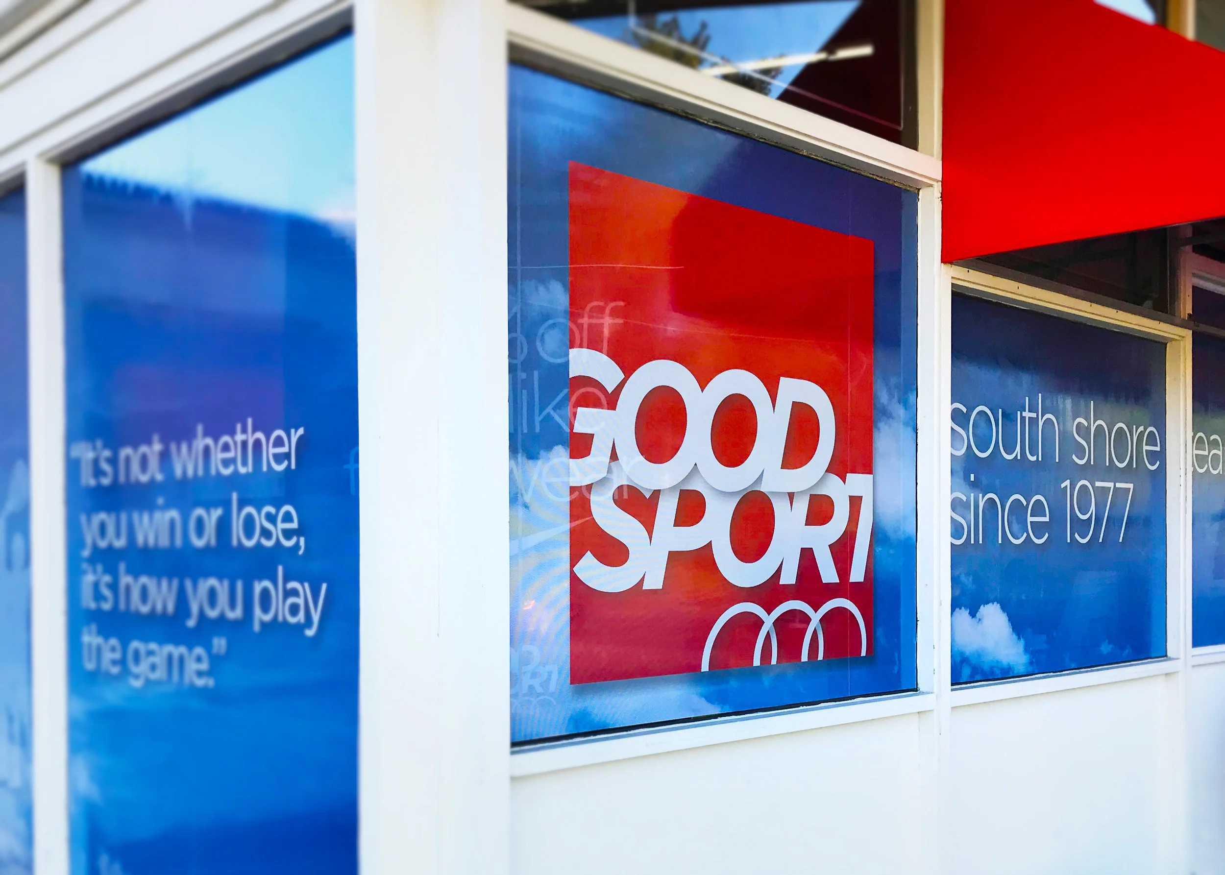 Side panel intersects with front of store.
