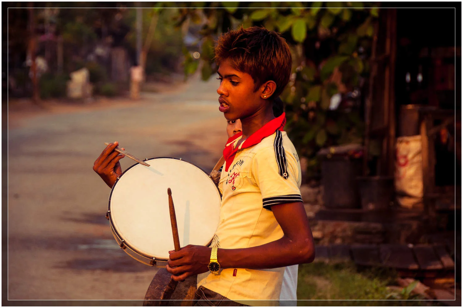 Kids and teenagers lead the way with their hypnotic drumming. © Dustin Main 2013