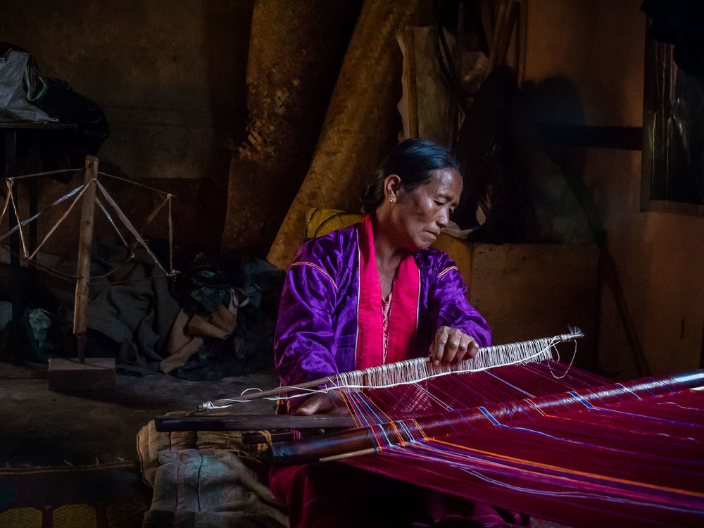 Danu woman back-strap weaving in rural Shan State